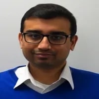 Mayank Singh, Director of Human Resources, Coordinated Family Care seen wearing a blue color sweater over a white color shirt